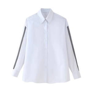 Women's white long sleeve shirt with contrast black side stripes and classic collar
