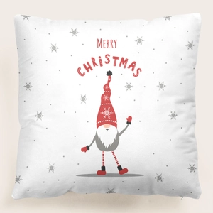 Detalle de funda de almohada con ilustración de gnomo y texto de Merry Christmas