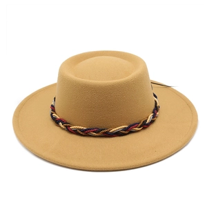 Close-up of ginger wool felt jazz hat featuring a multi-color braided rope band detail