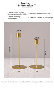 Detail view of gold iron candle holders in two sizes with specific height measurements