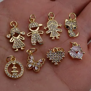 Selection of gold-plated micro-pave zircon charms in butterfly, boy, girl, and heart shapes