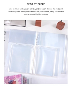 Detailed view of clear loose-leaf organizer with multi-layer pockets for stickers