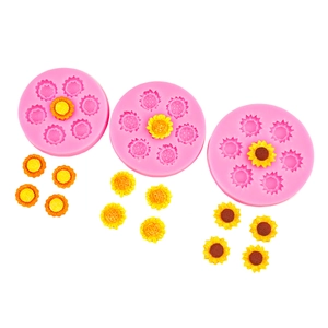 Sunflower and daisy silicone molds with handmade floral fondant cake decorations