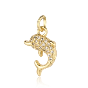 Detailed view of a gold dolphin pendant encrusted with sparkling cubic zirconia crystals