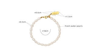 Detail of freshwater pearl bracelet with 18K gold letter tag and lobster clasp