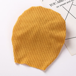 Ginger yellow ribbed knit baby turban hat with double bow detail for winter warmth
