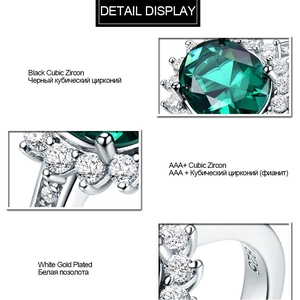 Classic 925 sterling silver ring featuring a large oval green gemstone and CZ accents