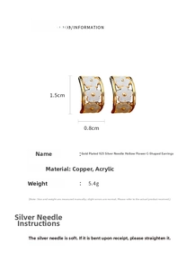 Detail view of gold-plated C-shaped flower earrings with size and material specifications
