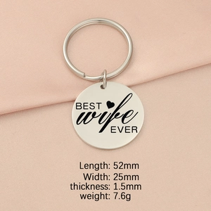 Detailed view of silver stainless steel keychain with BEST wife EVER laser engraving