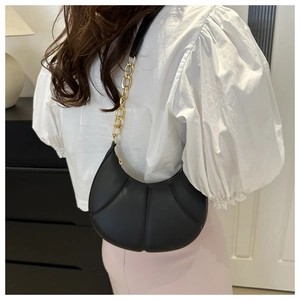 Chic black pleated crescent underarm bag with gold chain strap for women's summer style