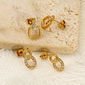 Golden titanium steel stud earrings set with zircon and geometric double-loop designs