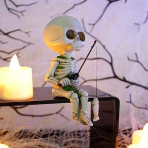 Detailed view of resin skeleton figurine fishing amidst spooky Halloween cobweb background