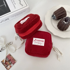 Minimalist plush and corduroy storage bags in dark red with chic ribbon zippers