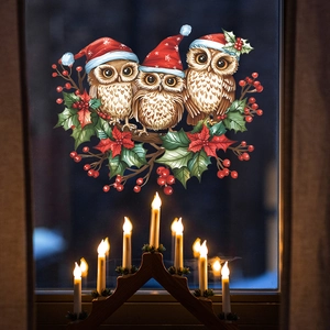 Detailed Christmas window stickers with festive owls on branches and holly berries