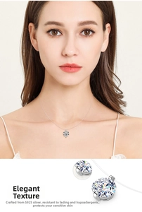 Macro detail of S925 sterling silver mermaid tear pendant with round brilliant cut cubic zirconia