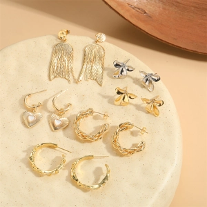 Chic 14K gold plated earring set featuring heart charms and textured C-hoop designs