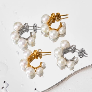 Elegant C-shaped stainless steel earrings with clustered pearls in gold and silver