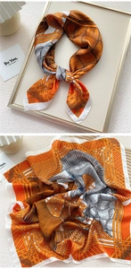 Detailed pattern of orange and white silk square scarf with geometric weave design