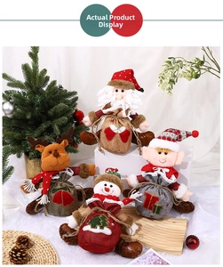 Christmas burlap gift bags with Santa, reindeer and snowman figures on a white background