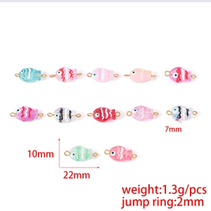 Hand-painted glass fish charms for DIY jewelry making in assorted vibrant colors