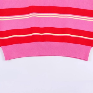 Pink and red striped knit polo shirt featuring a ribbed hem and horizontal pattern