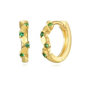 Close-up of gold hoop earrings with green zircon stones and geometric facets on white background