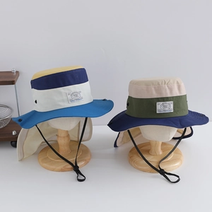 Detail of breathable mesh and neck protection flap on outdoor sun hat for kids