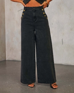 Detailed view of high waist wide leg jeans in dark grey wash with gold side buttons