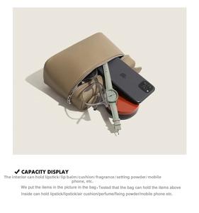 L19 leather bag capacity display with smartphone, watch, and cosmetics inside