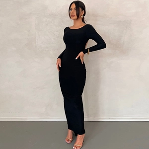 Detailed back view of a slim-fit backless maxi dress with soft pleated texture
