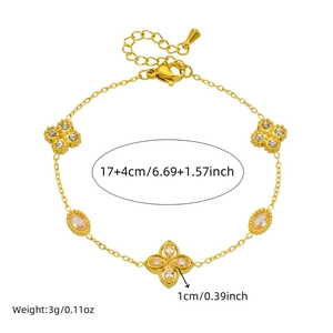 Golden double-layer stainless steel bracelet with clover motifs and orange gemstone