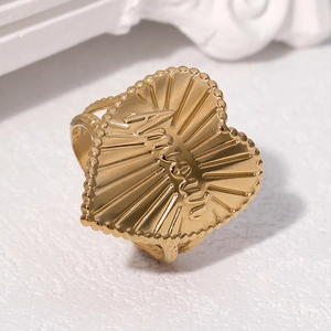Golden heart-shaped stainless steel ring with Amour engraving and textured finish