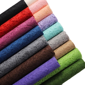 Premium textured fiber paper rolls for bouquet wrapping and DIY crafts in vibrant colors