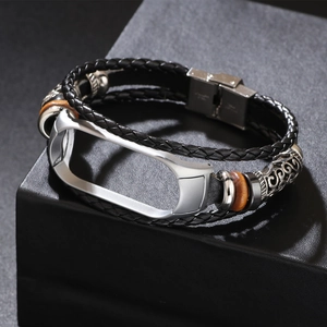 Close-up of retro ethnic style leather strap with vintage silver metal frame for Mi Band