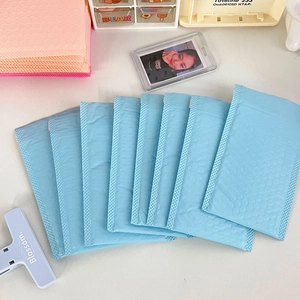 Detailed view of light blue bubble padded mailing envelopes for jewelry and small cards