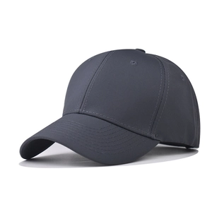 Detail of dark gray 6-panel baseball cap with breathable eyelets and curved brim