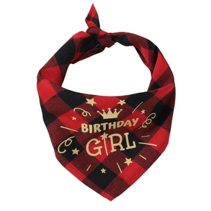 Detail of red and black plaid dog bandana with gold Birthday Girl crown print