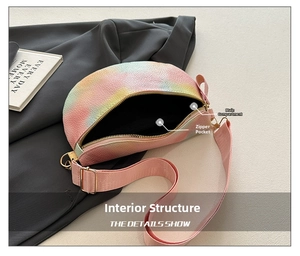 Detail view of the interior compartment and zipper pocket of the rainbow gradient waist bag