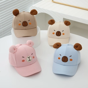 Detailed display of four cotton baseball caps with bear ears in multiple pastel colors
