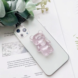Supporto impugnatura pop socket a forma di orsetto rosa glitterato per smartphone.