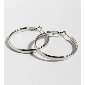 Minimalist polished silver large hoop earrings for women on a clean white background
