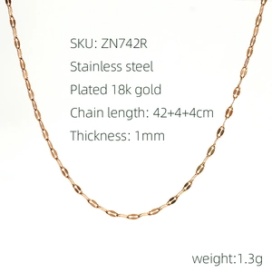 Detailed macro view of 18k rose gold plated stainless steel necklace chain links