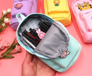 Detail view of large capacity mint green canvas pencil case with cute animal patches