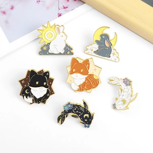 Creative enamel pins set featuring cartoon rabbits, foxes, and koi fish with celestial motifs
