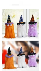 Three plush Halloween gnome monsters with wizard hats, sequins and sharp white fangs
