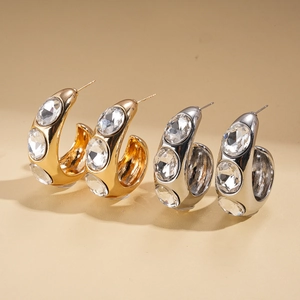 Minimalist geometric C-shaped earrings with sparkling crystals in gold and silver finish
