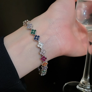 Close-up of elegant floral bracelet with multicolored cubic zirconia on a wrist