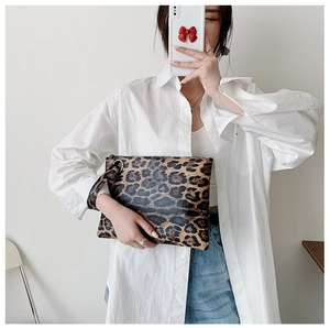 Chic leopard print envelope clutch bag for women with a stylish wristlet strap