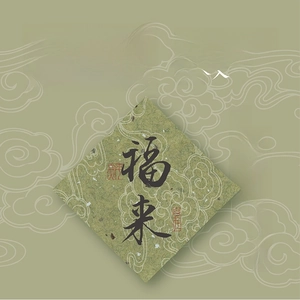 Detailed macro view of an 80x80mm acrylic fridge magnet with green clouds and calligraphy