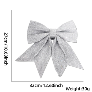 Detail view of a large silver glitter bow ornament, sized 27cm by 32cm for Christmas decor